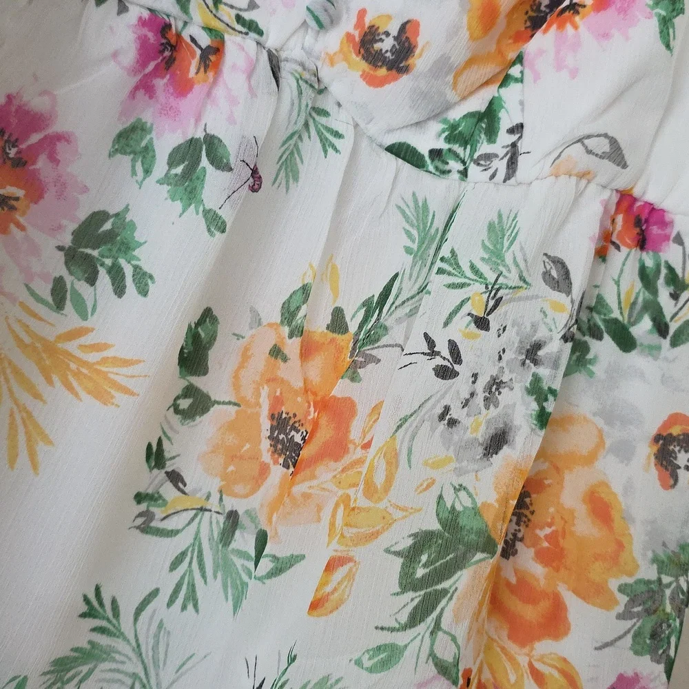 Torrid Floral with Orange and Green Accents